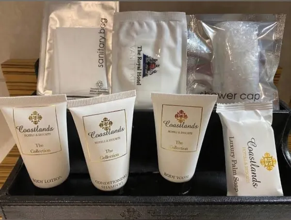 Coastlands-branded bathroom amenities laid out on a tray